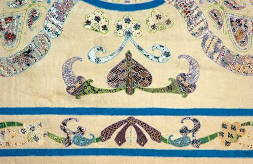 Close up detail of the applique on The Ladies Work Society Coverlet 