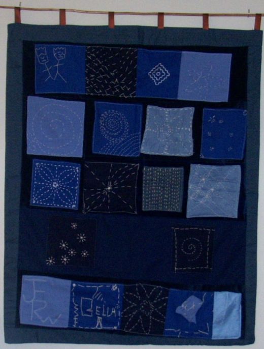 Mini sister patchwork quilt to the Community Patchwork Quilt (Inspirations York)